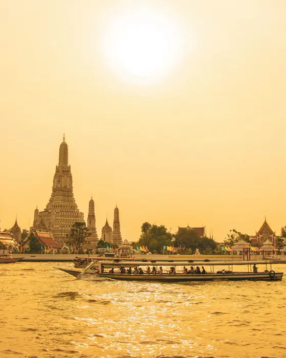 Riverside temple at sunset